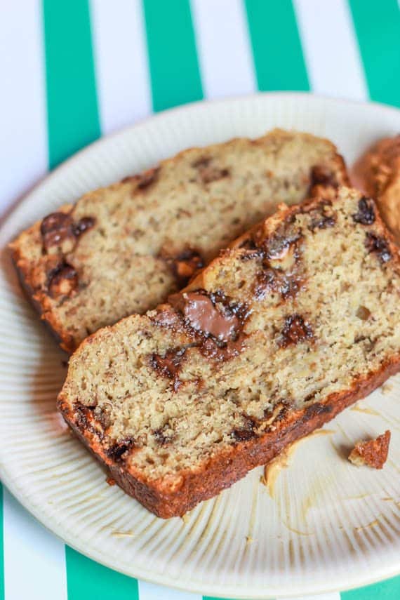slices of Nutella swirl peanut butter banana bread on a white plate