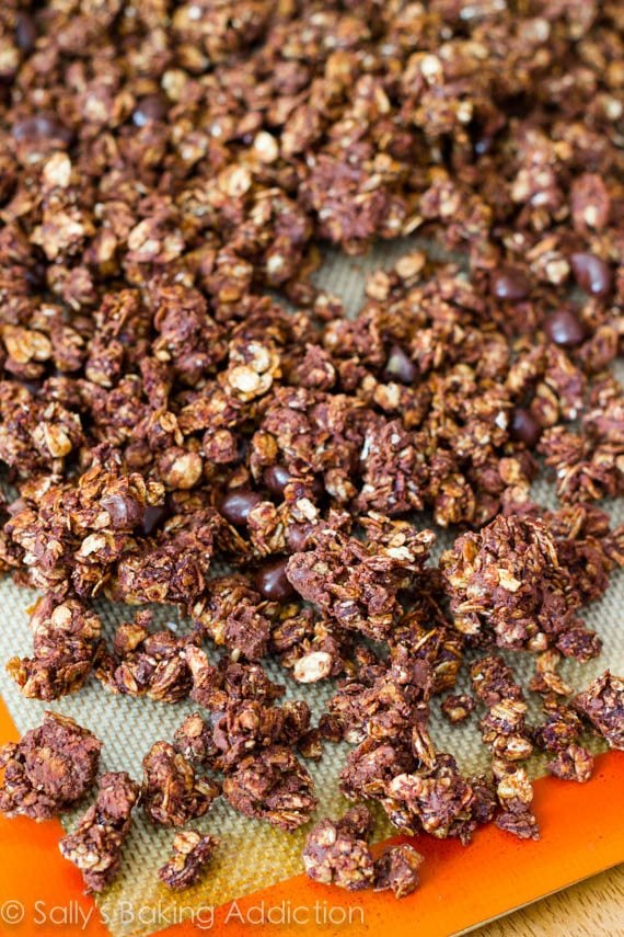 triple chocolate crunch granola on a silpat baking mat