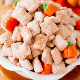 pumpkin spice puppy chow in a bowl