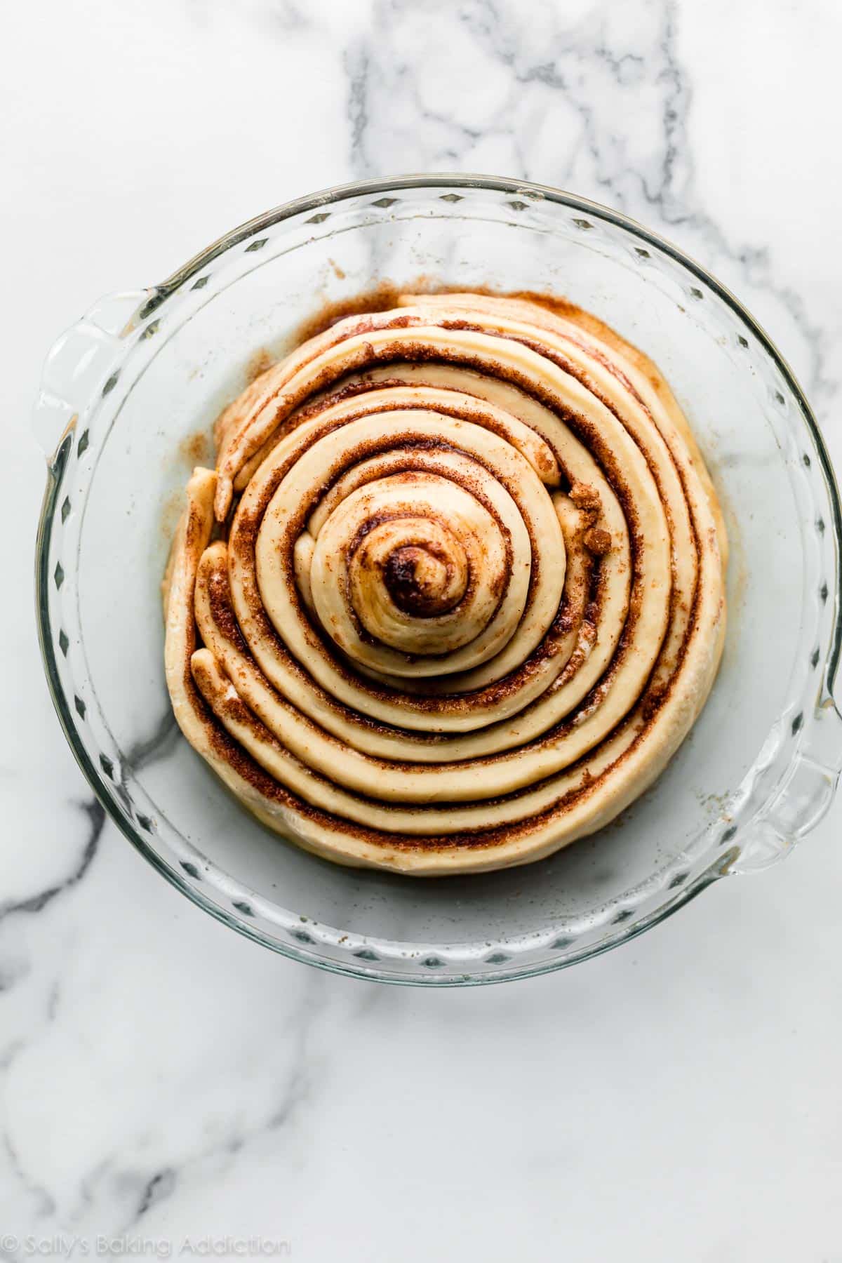 giant cinnamon roll cake before baking