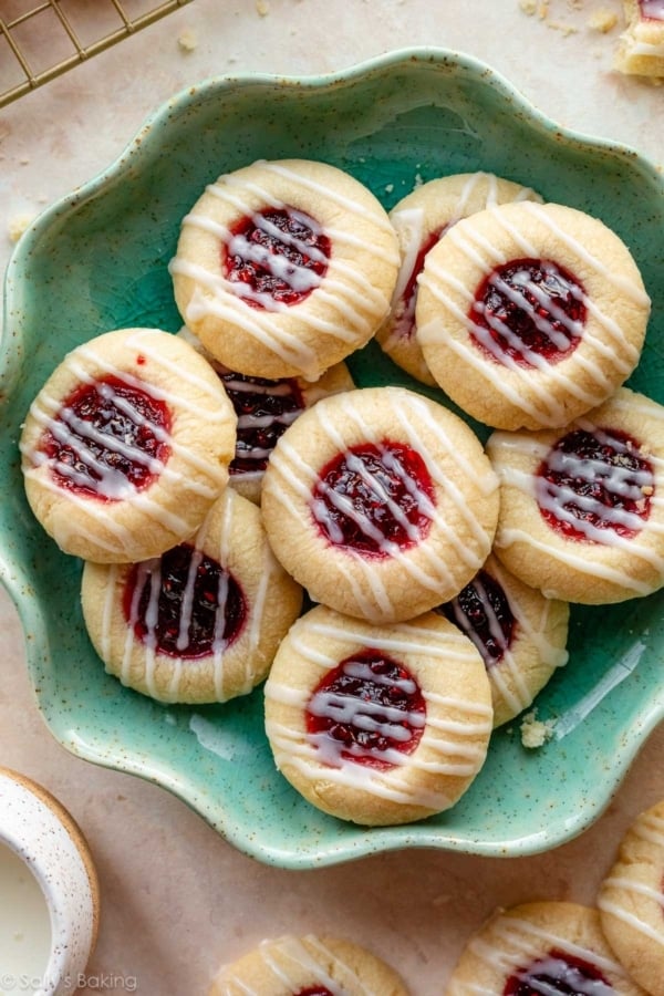 raspberry almond thumbprints on blue plate.