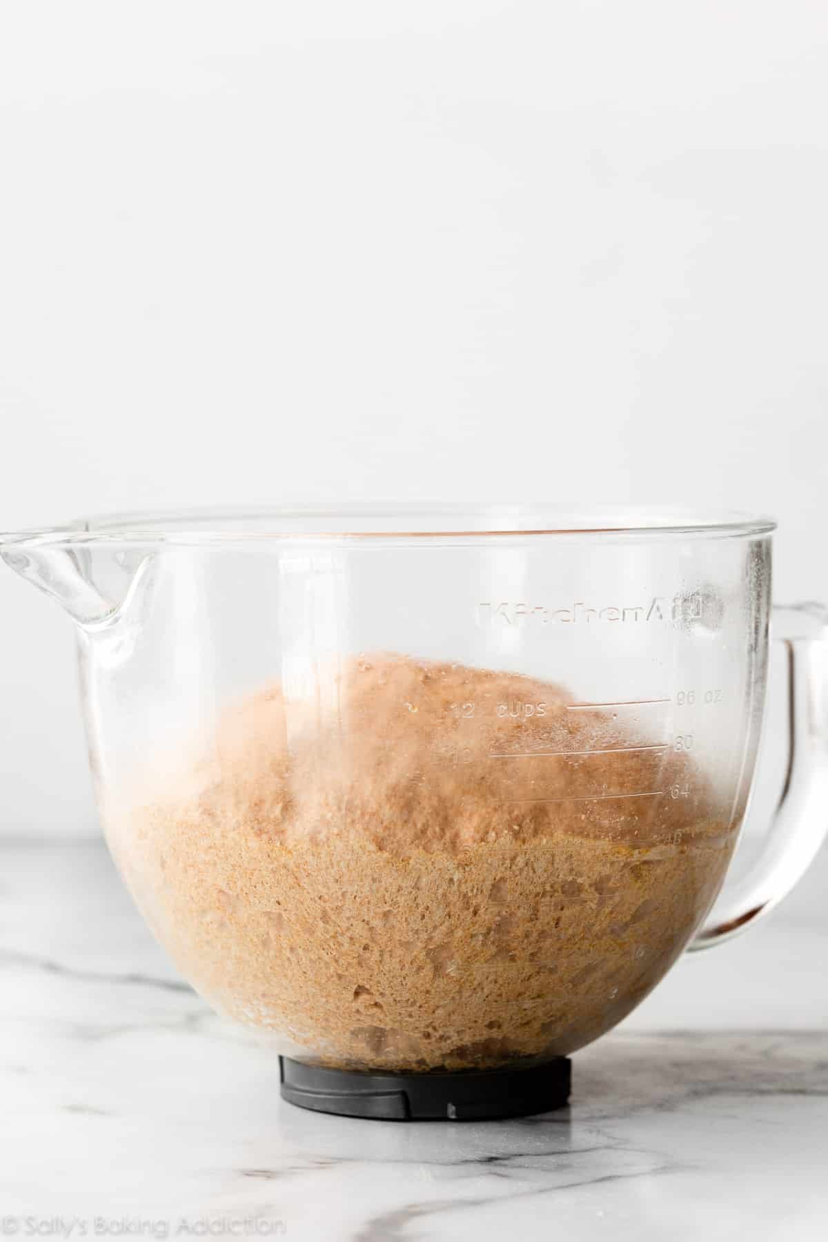 dough pictured in bowl after rising