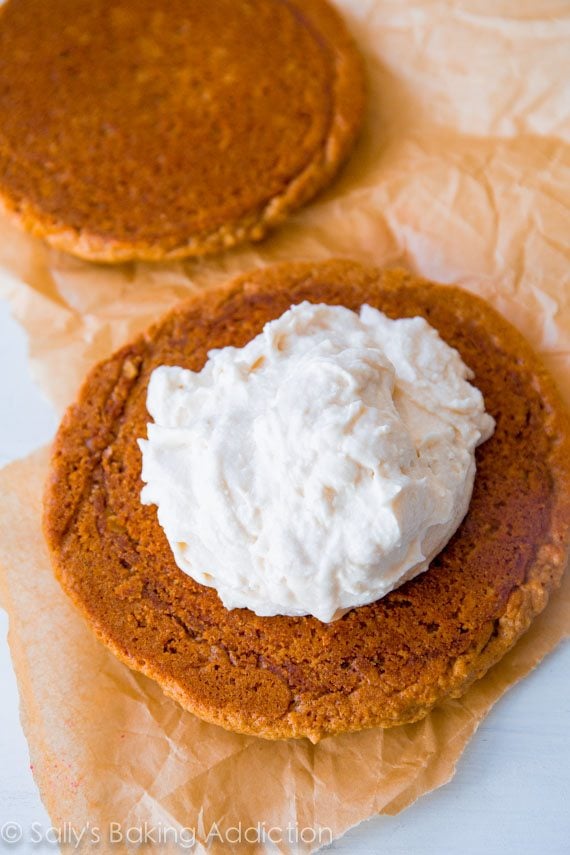 creme filling on top of an oatmeal cookie