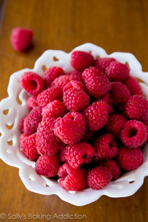 raspberries in a white bowl