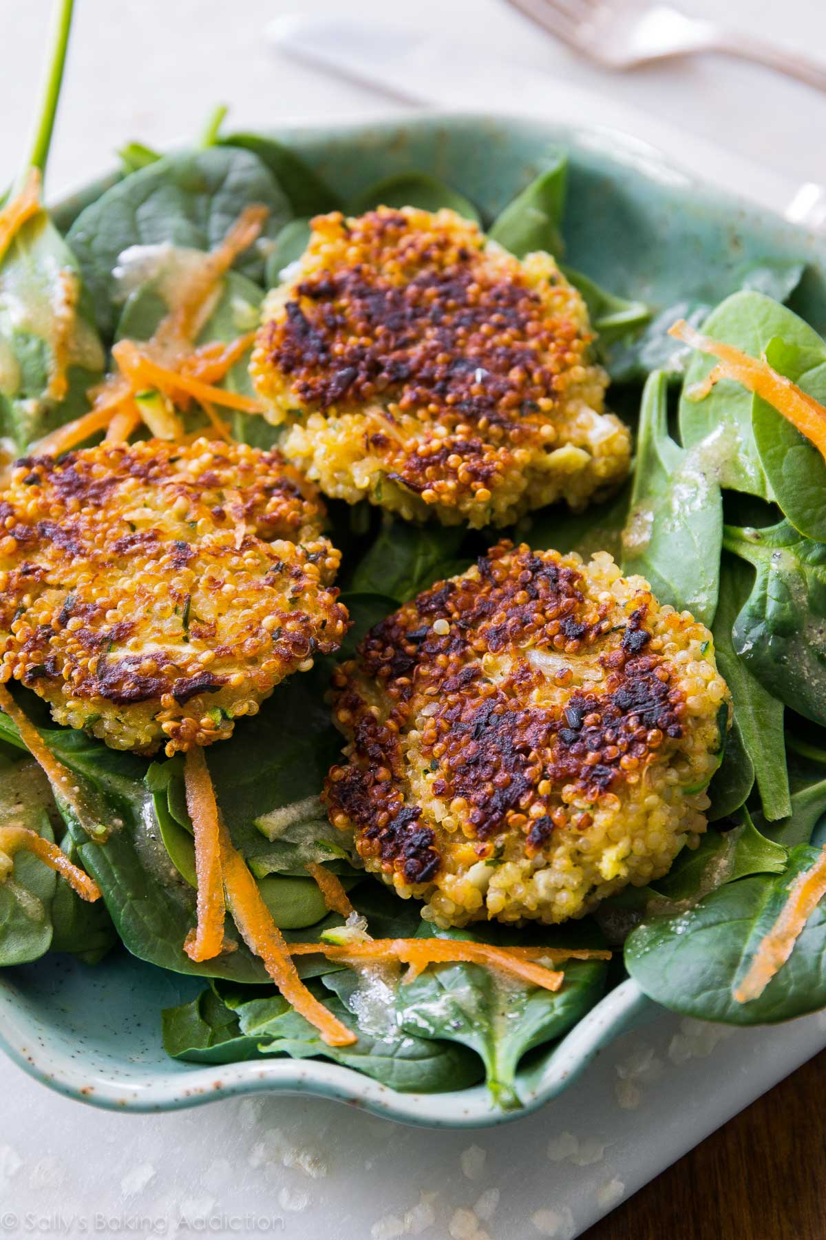 quinoa patties on a salad