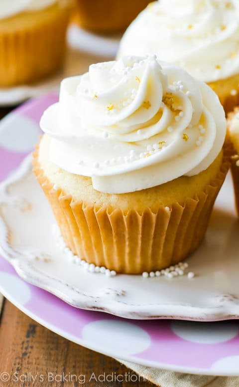 white wedding cupcakes on a white plate