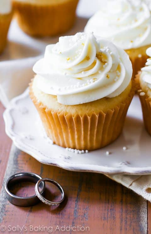 white wedding cupcakes on a white plate