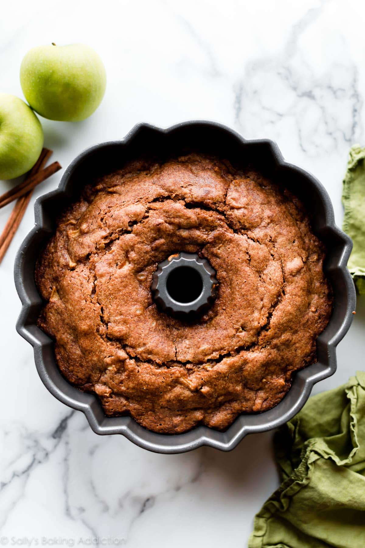 apple bundt cake in a bundt pan after baking
