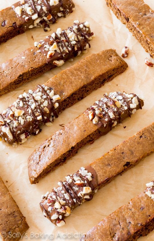 mocha chip biscotti with part of each cookie dipped into chocolate