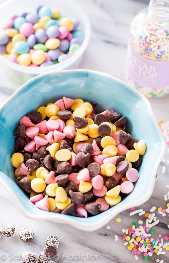 assorted chocolate chips in a blue bowl