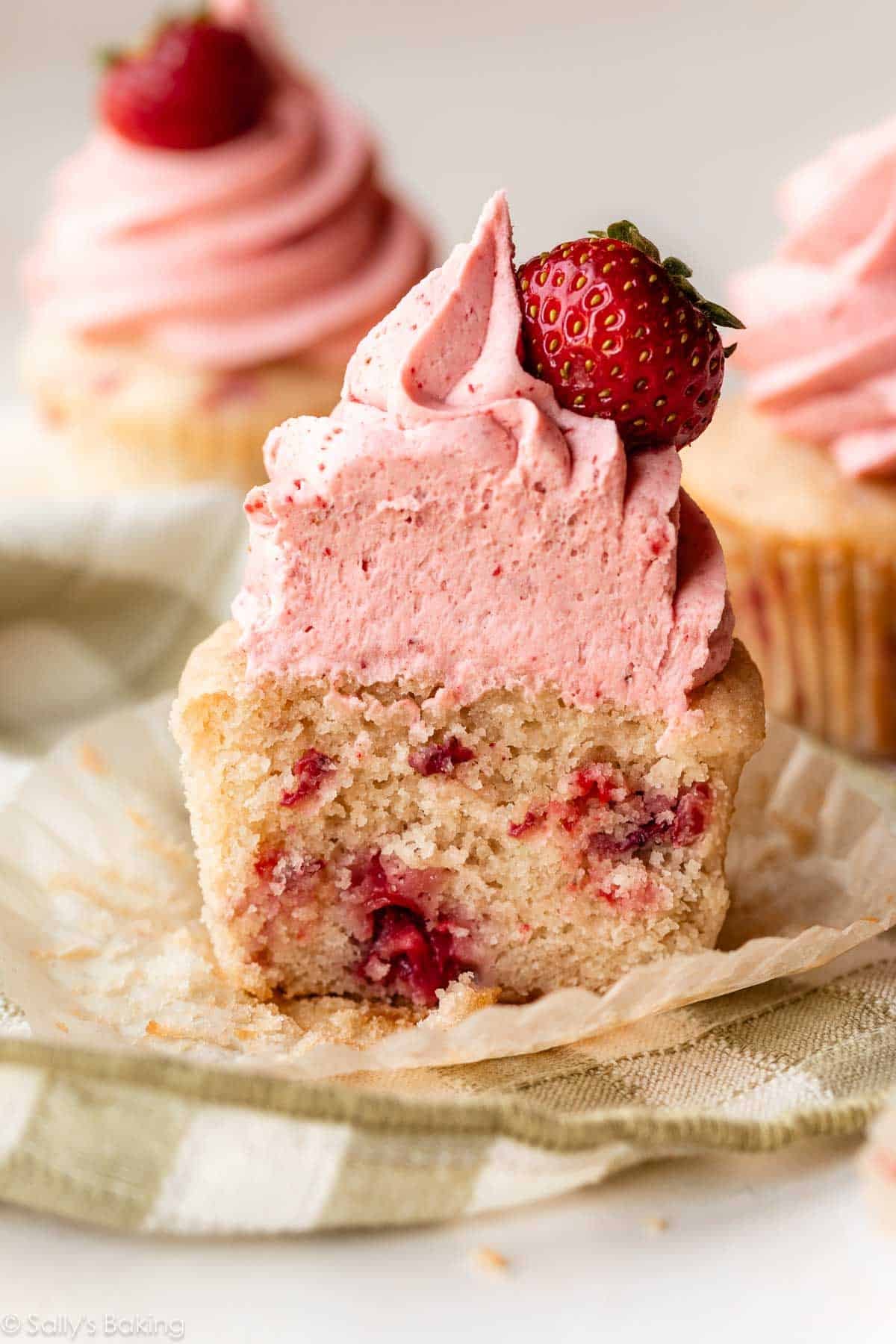 strawberry cupcake with strawberry buttercream.