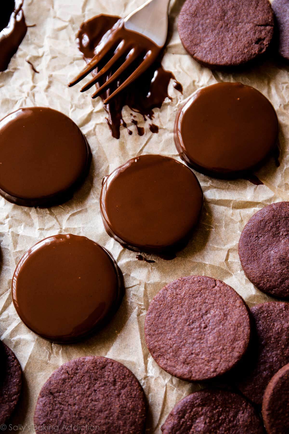circle chocolate sugar cookies dunked into chocolate