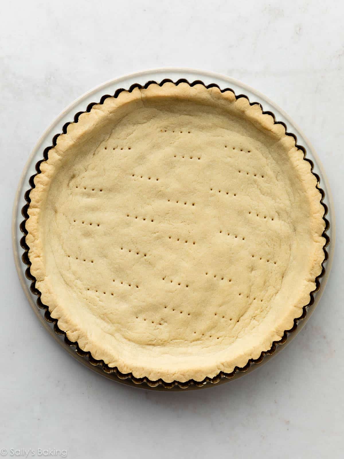 baked pastry crust in tart pan.