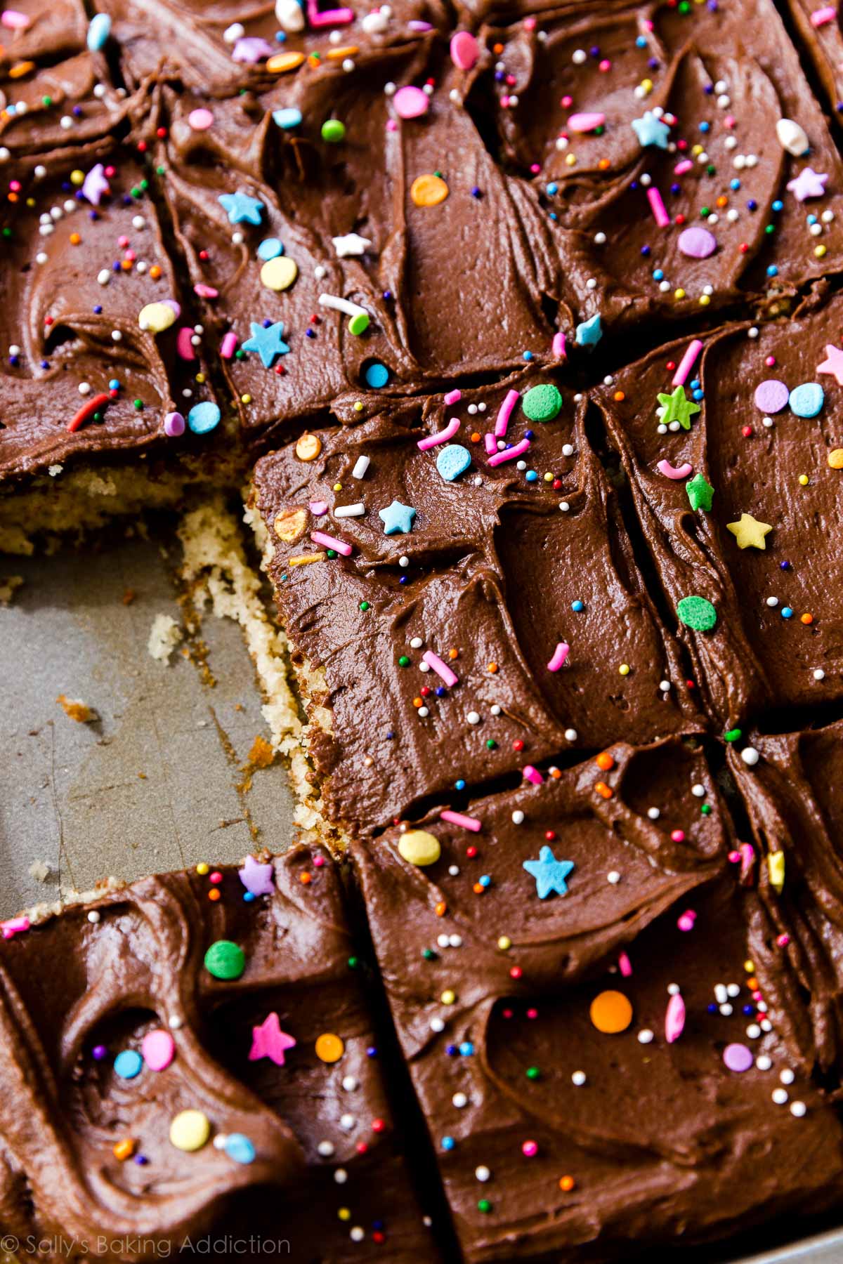 yellow sheet cake topped with chocolate frosting