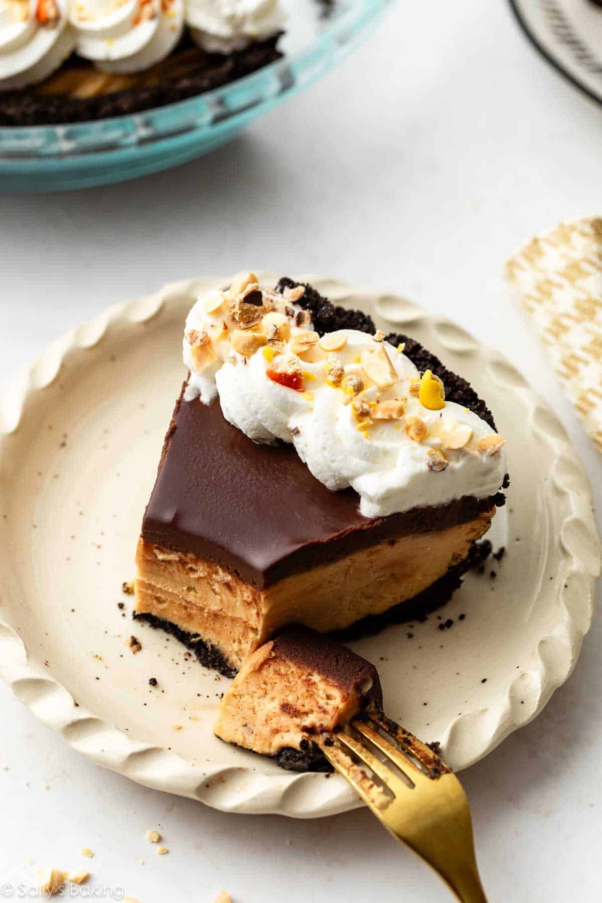 slice of peanut butter pie on ceramic plate.