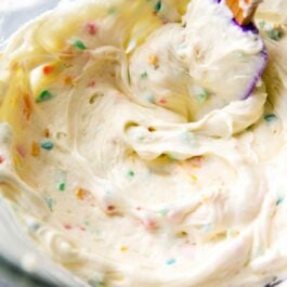 rainbow chip frosting in a glass bowl