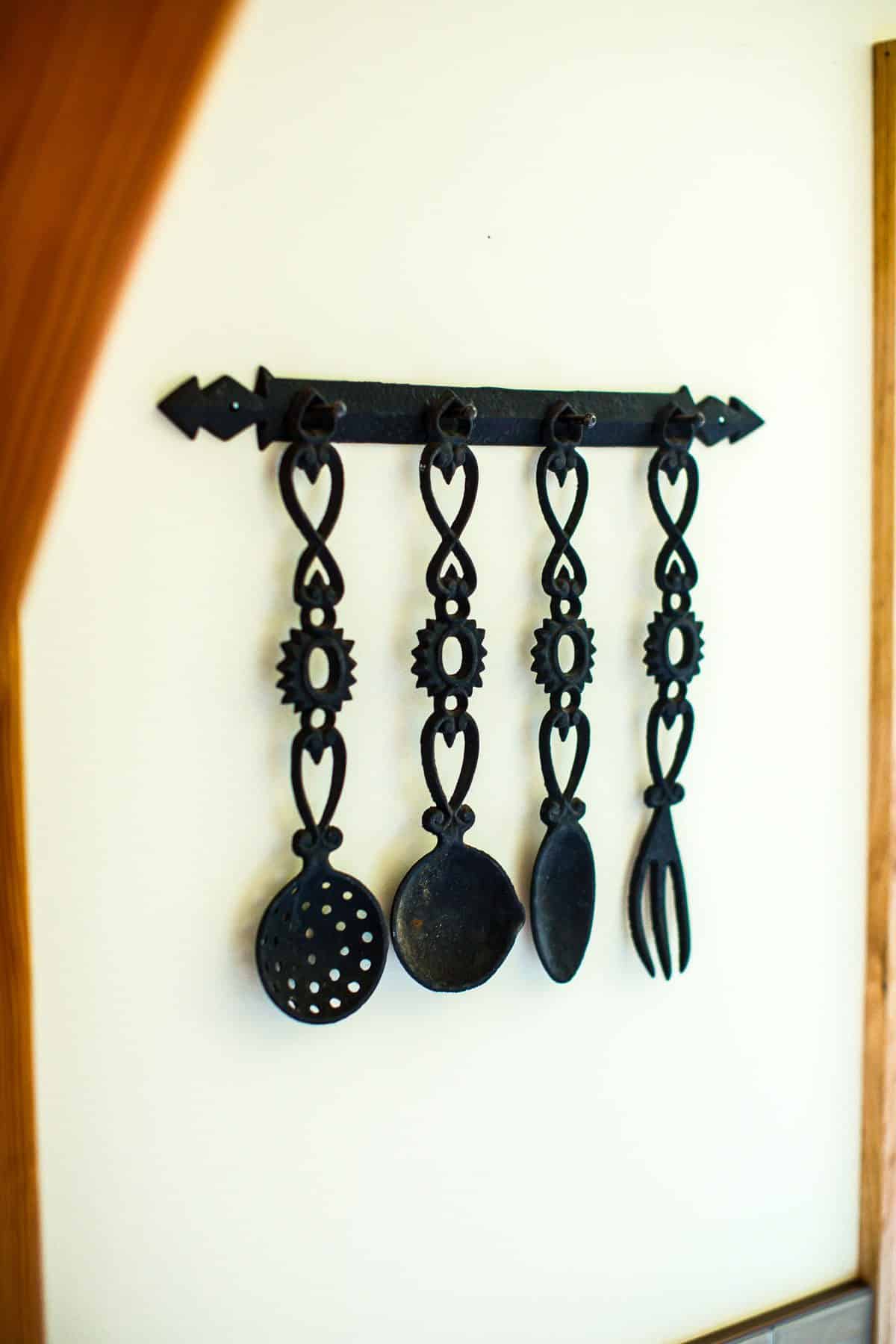 hanging decor on the wall in the kitchen