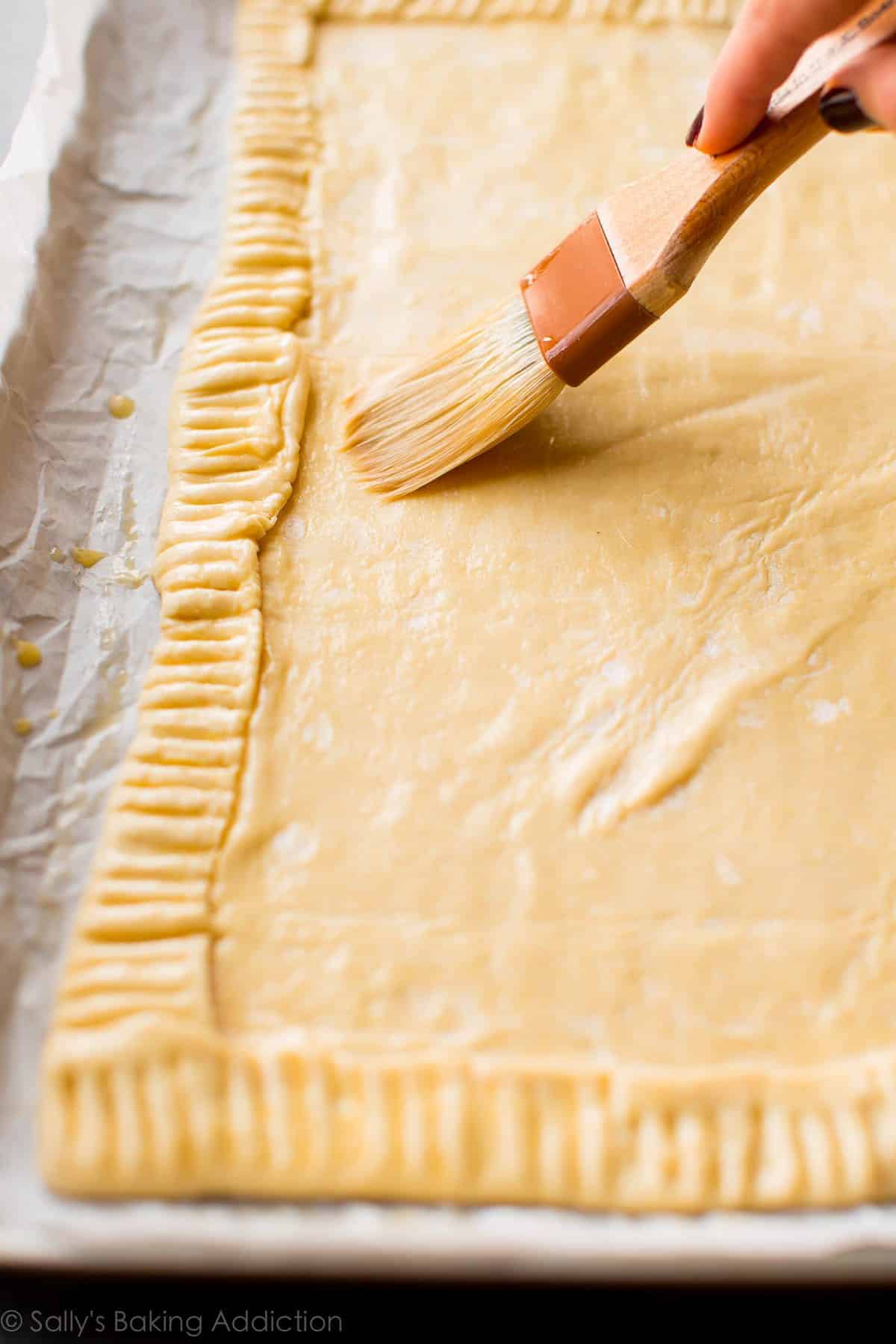 brushing crust with egg wash