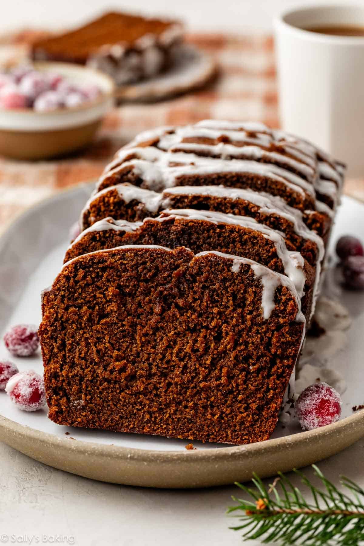 sliced gingerbread loaf with icing on top.