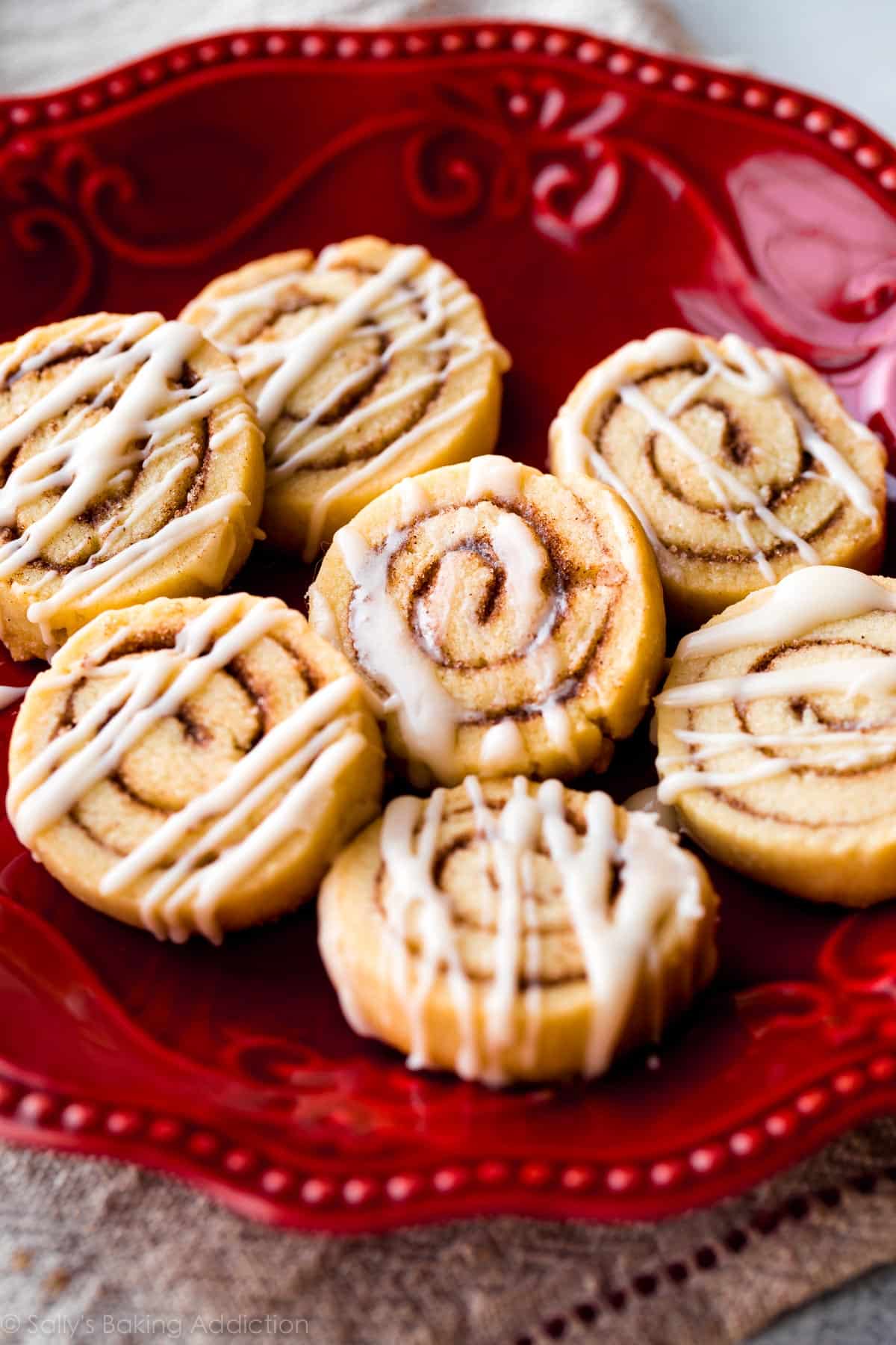 cinnamon roll sugar cookies on a red plate
