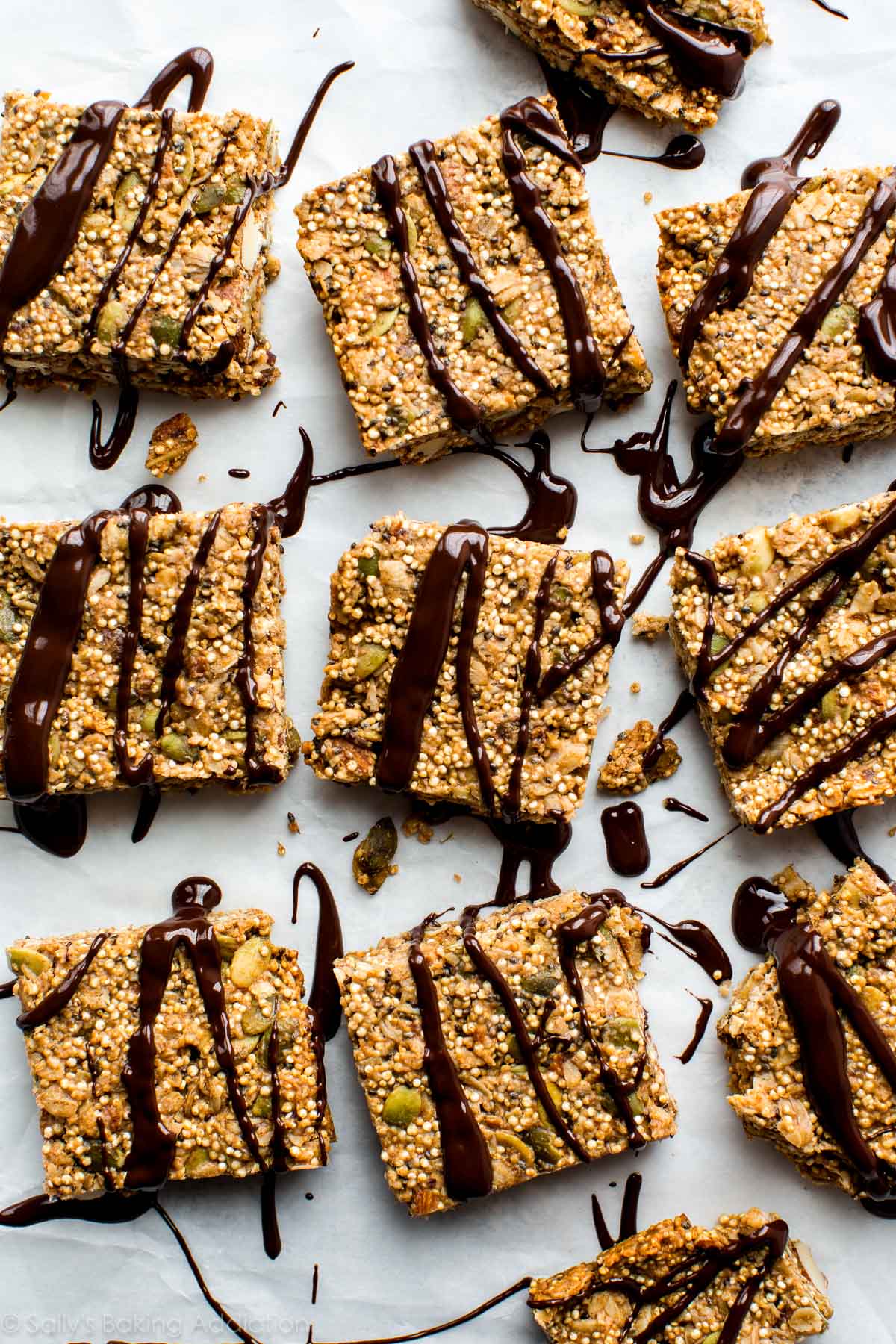 quinoa bars with melted chocolate on top.