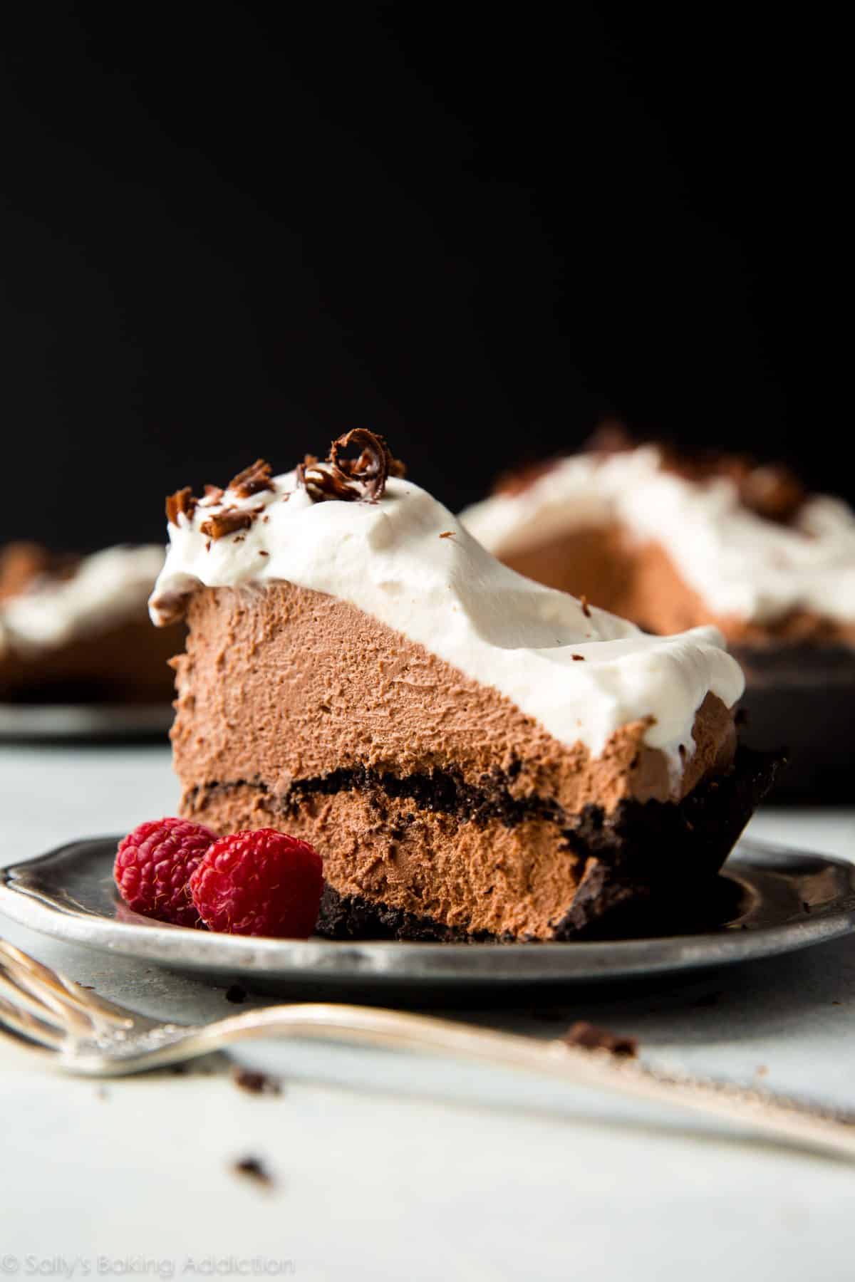 slice of chocolate mousse pie on a silver plate with a fork