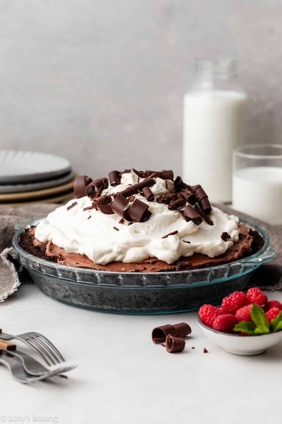 chocolate mousse pie with whipped cream and chocolate curls.