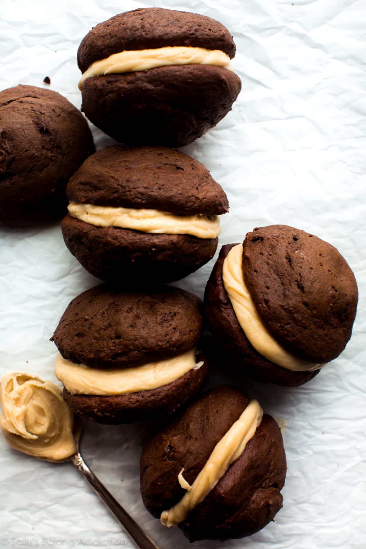 overhead image of chocolate whoopie pies with salted caramel frosting