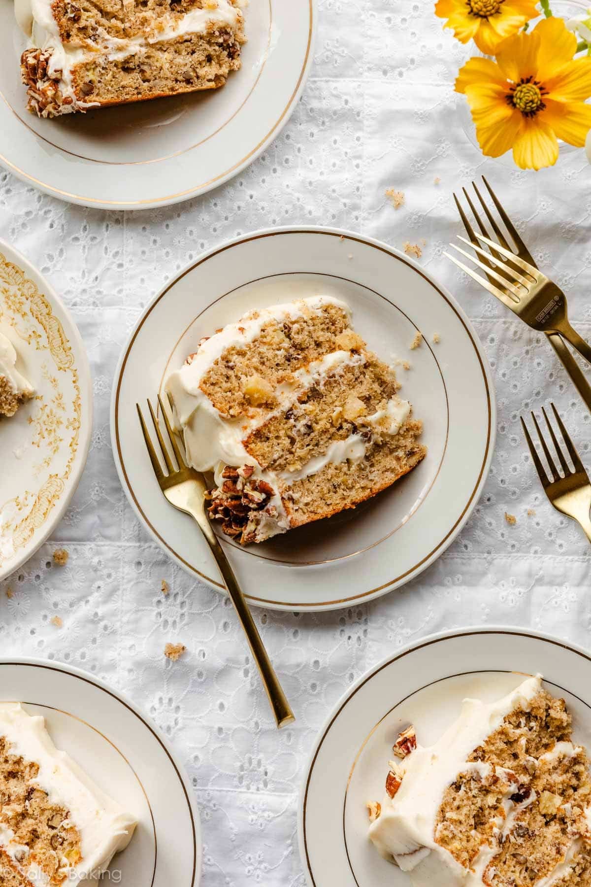 slices of hummingbird layer cake on plates.