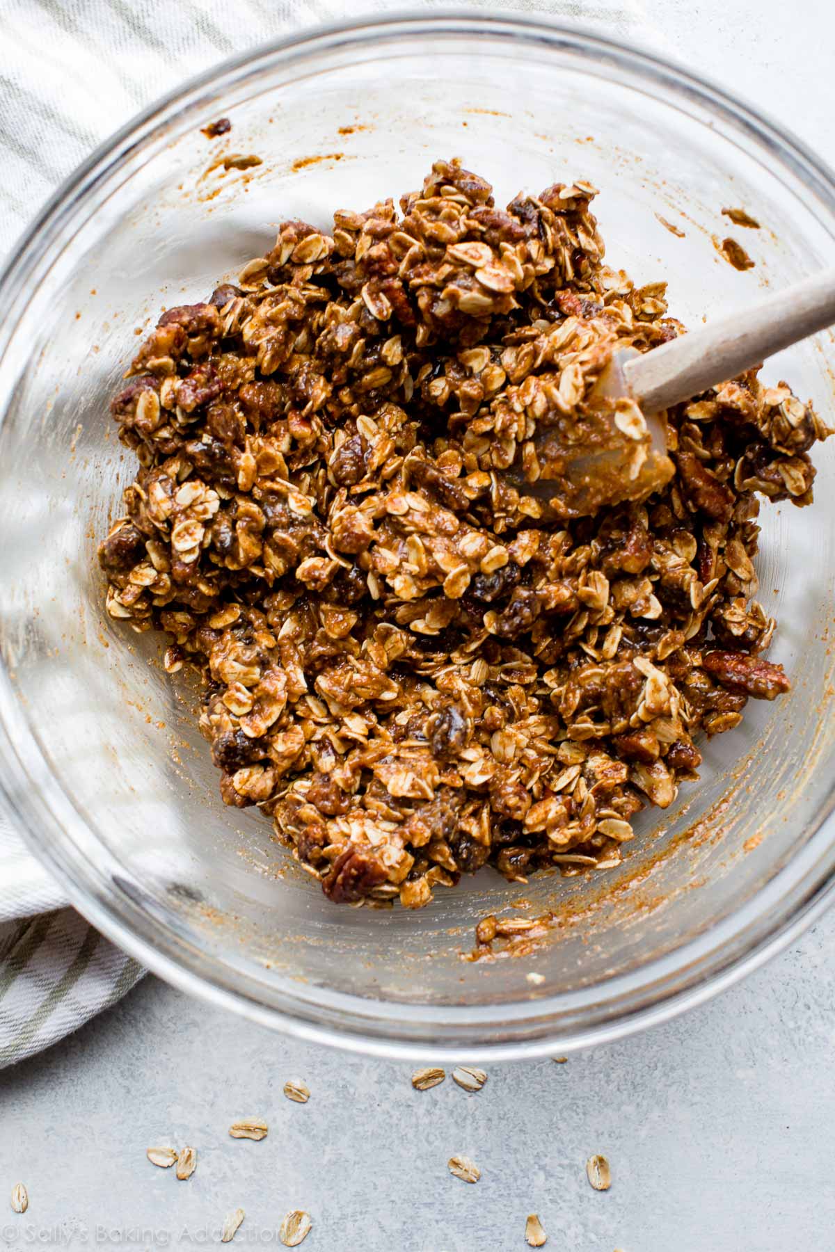 oatmeal raisin granola bar mixture in a glass bowl