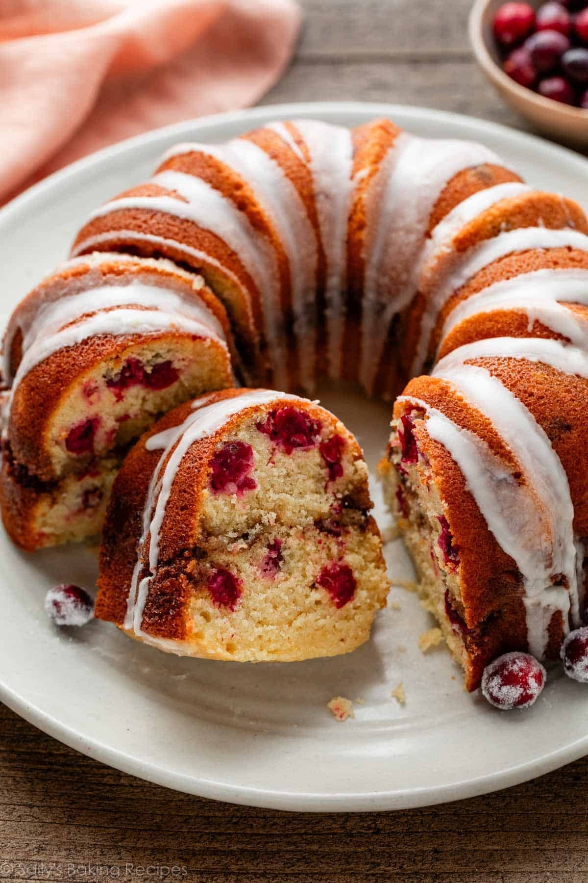 cranberry Bundt cake with glaze on top.