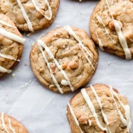 coconut macadamia nut cookies with white chocolate drizzle