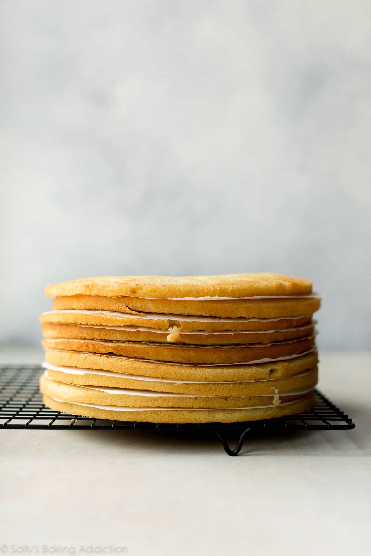 stack of Smith Island cake layers on a cooling rack