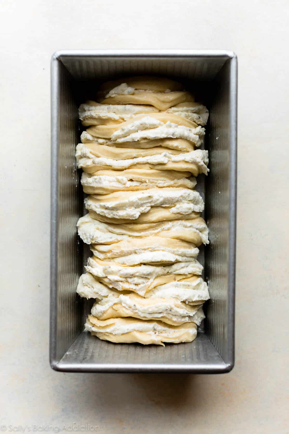 pull apart bread assembled in loaf pan before baking