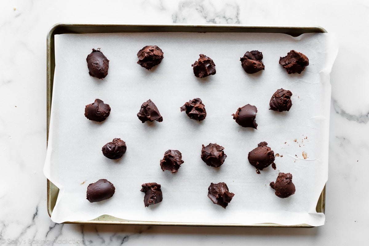 chocolate truffles before shaping on a parchment lined baking sheet
