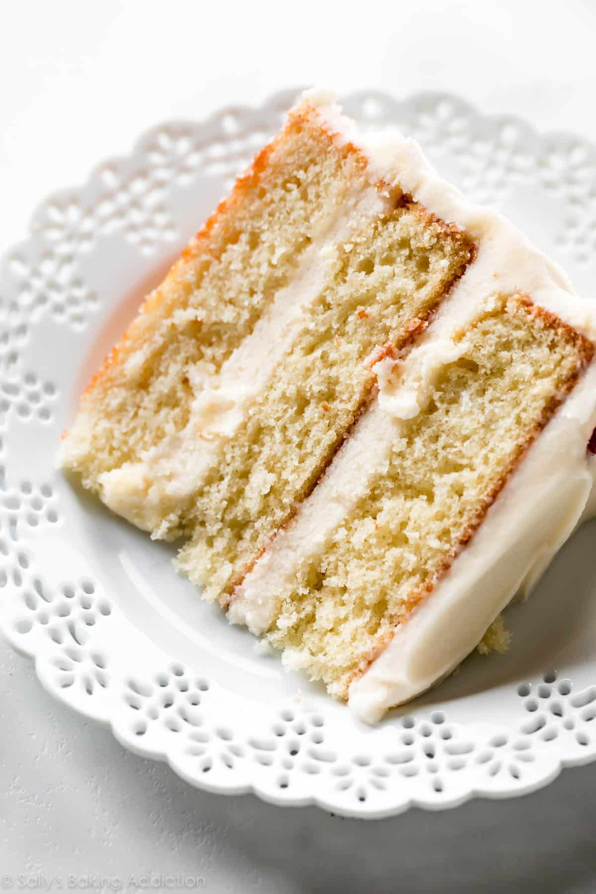 Vanilla cake slice on white plate