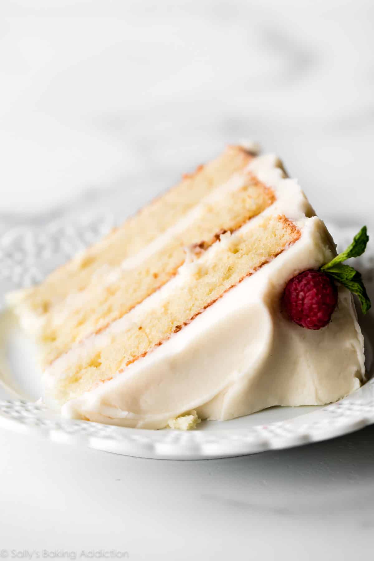 Vanilla cake slice on white plate