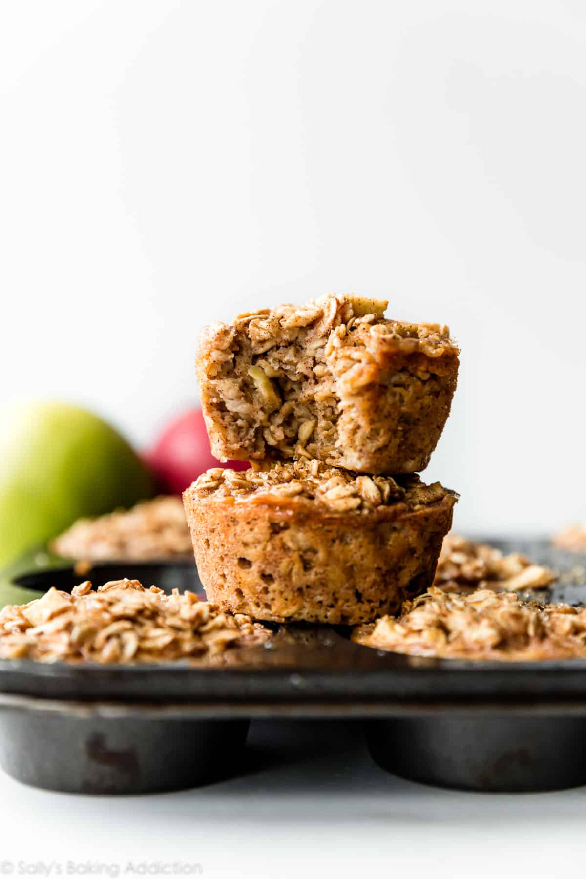 stack of apple cinnamon baked oatmeal muffins