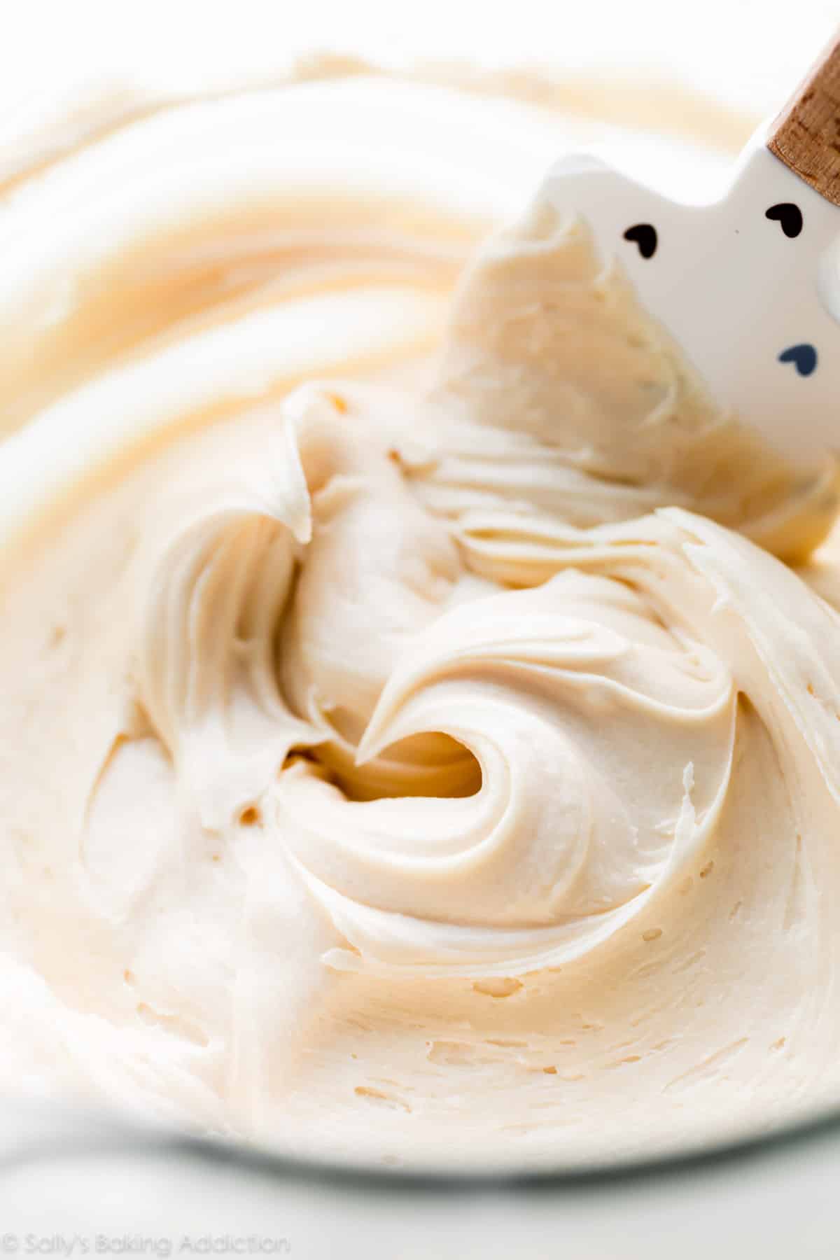 burnt sugar frosting in a glass bowl