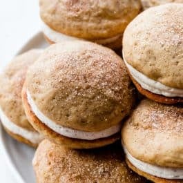 apple cinnamon spice whoopie pies on a plate