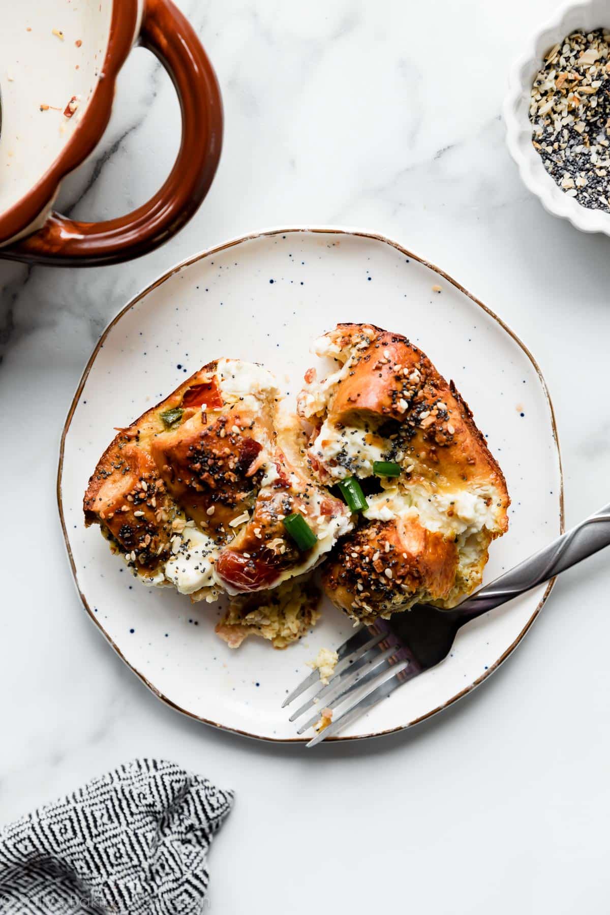 piece of everything bagel breakfast casserole on a plate