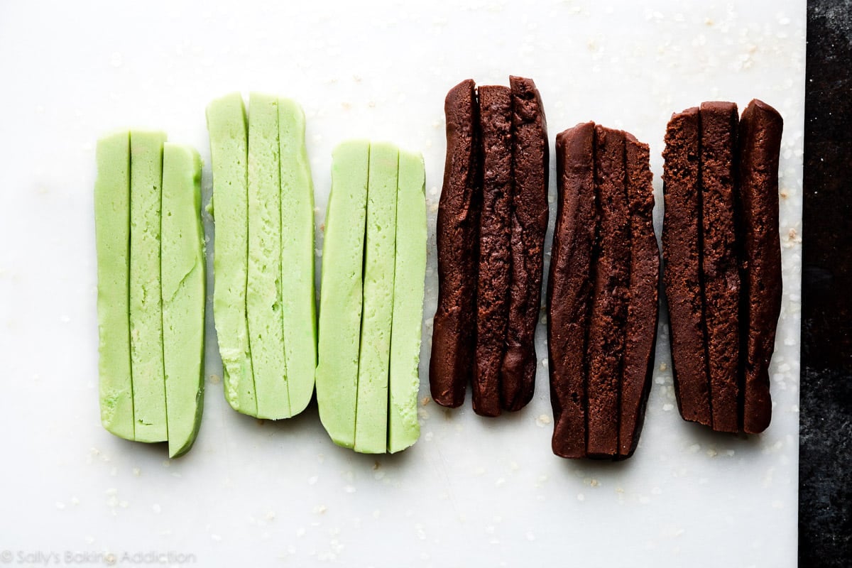 mint cookie dough and chocolate cookie dough cut into strips