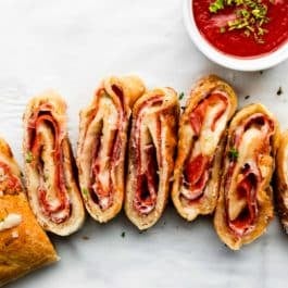 stromboli with Genoa salami, pepperoni, provolone, and mozzarella cheese