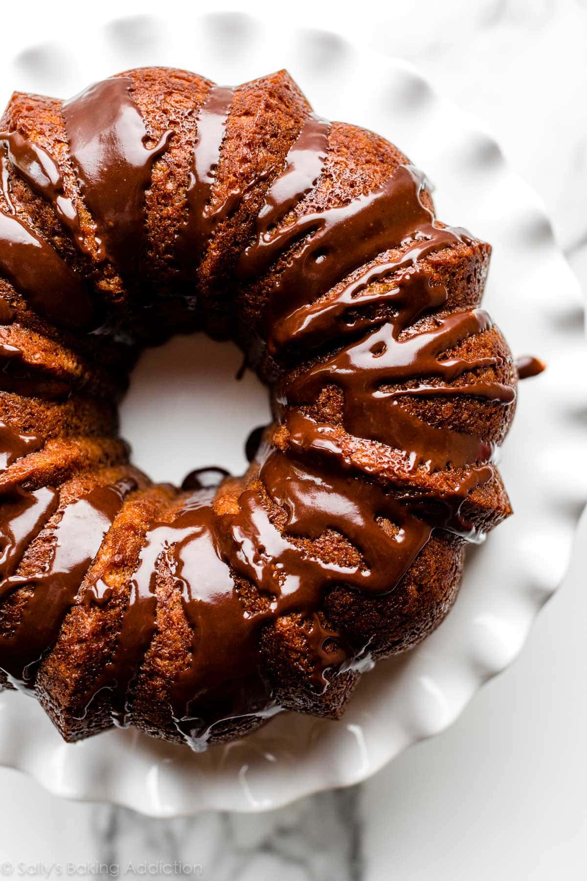 banana bundt cake topped with chocolate ganache