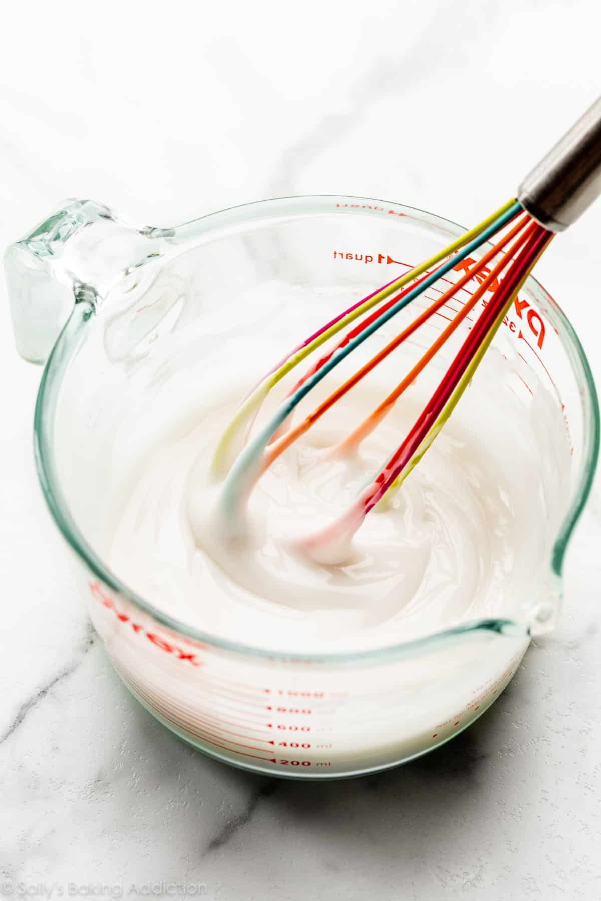 white cookie icing in glass bowl