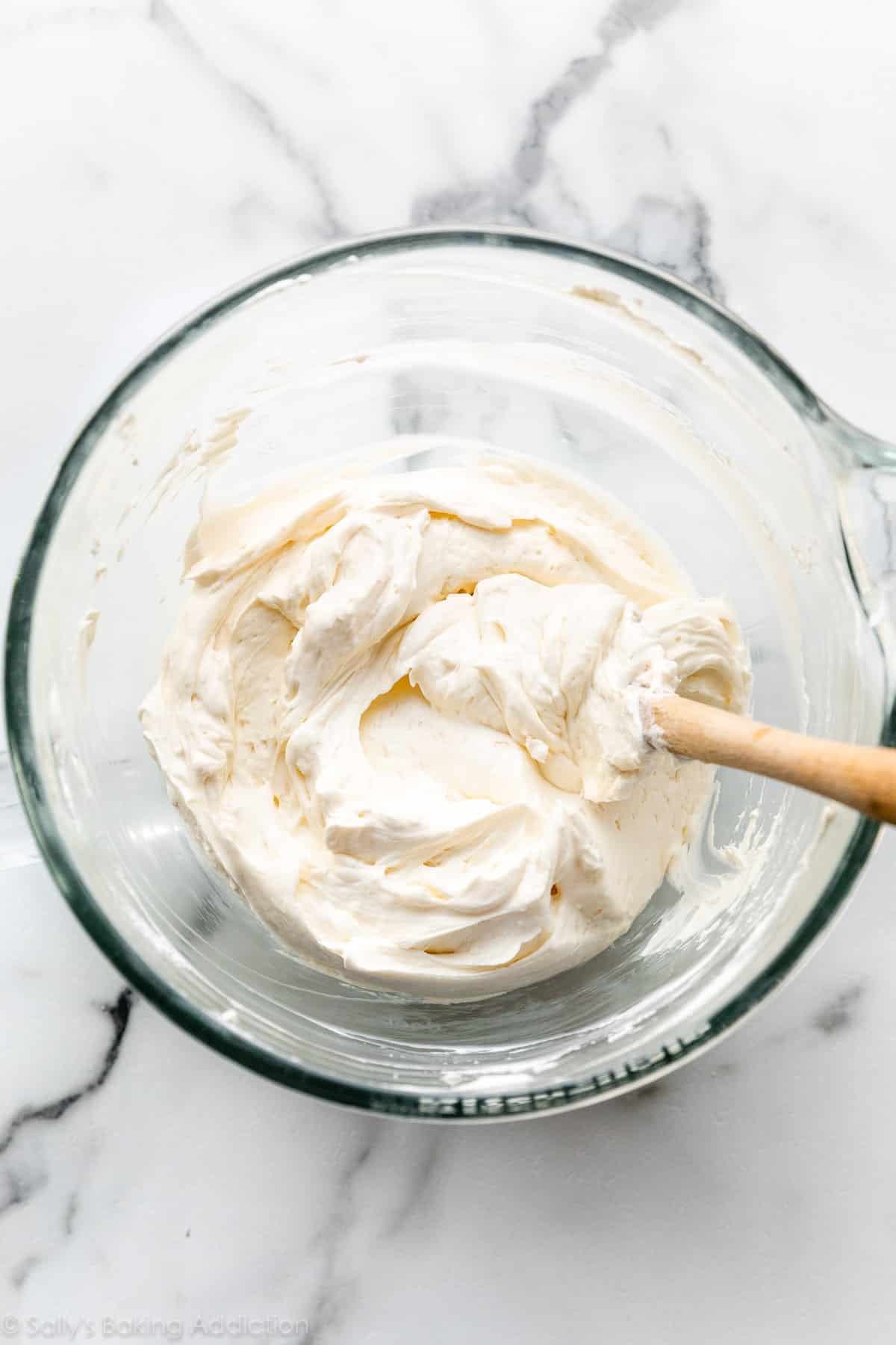 whipped creamy filling in glass bowl
