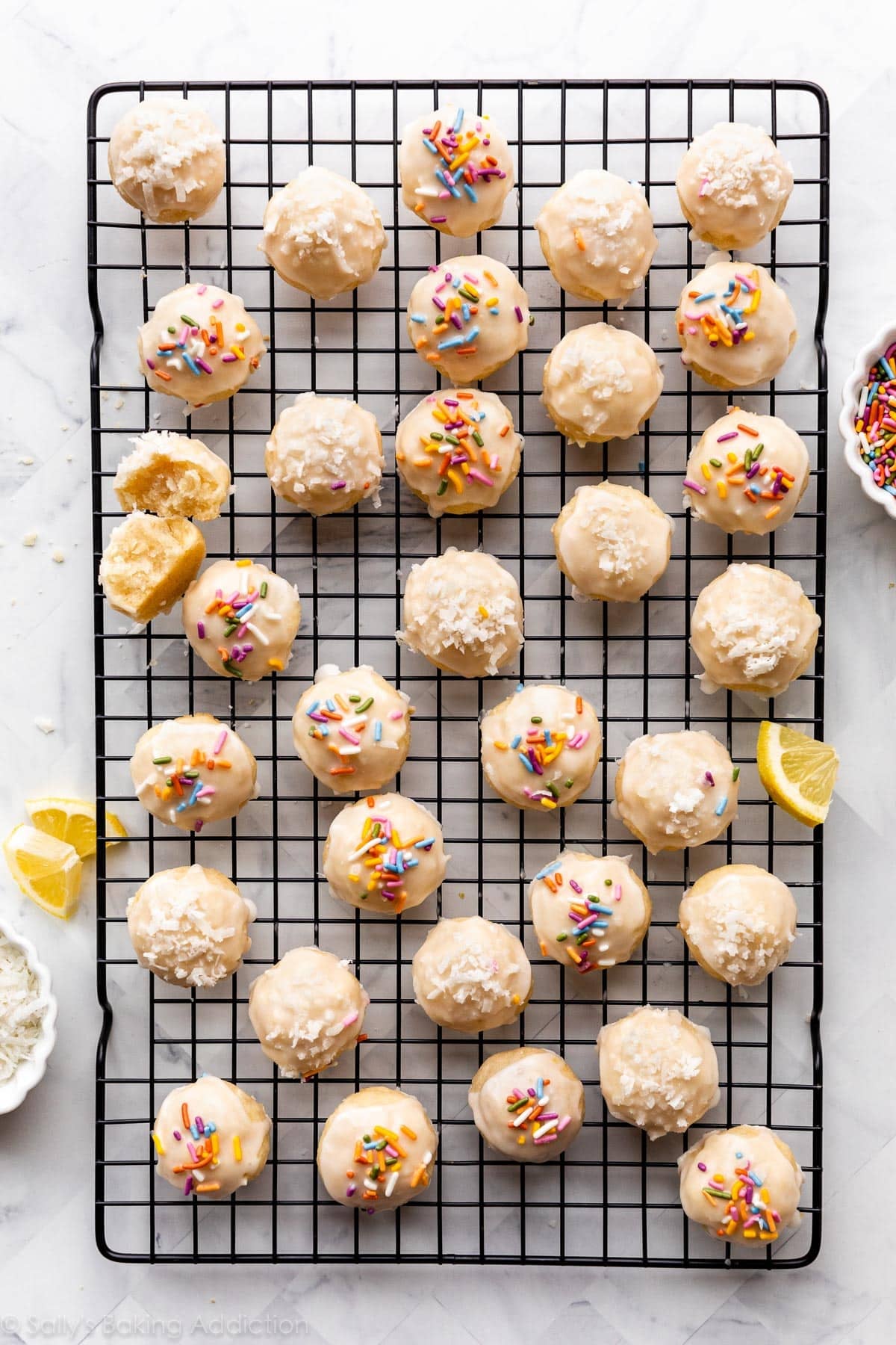 glazed lemon coconut drop cookies on cooling rack