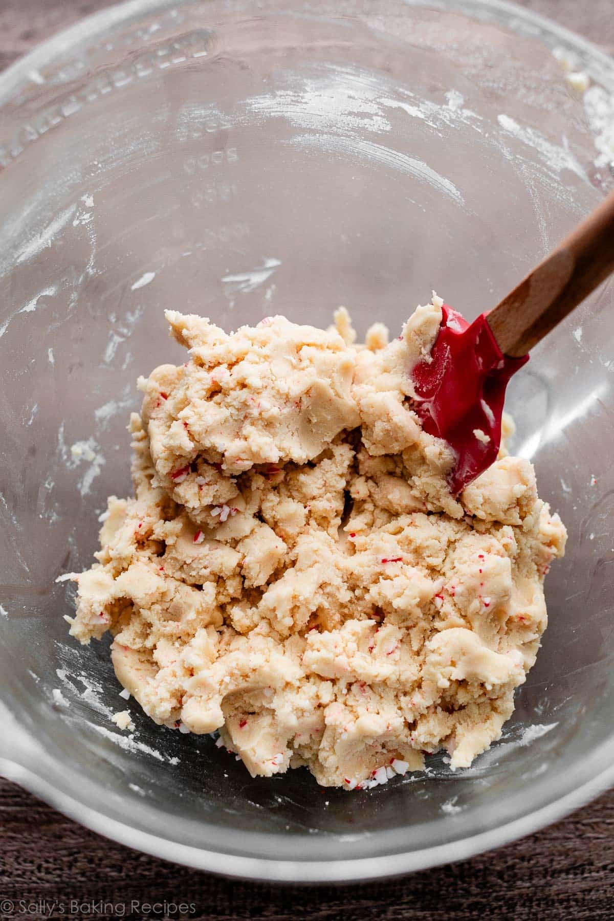 peppermint candy cane cookie dough in glass bowl.