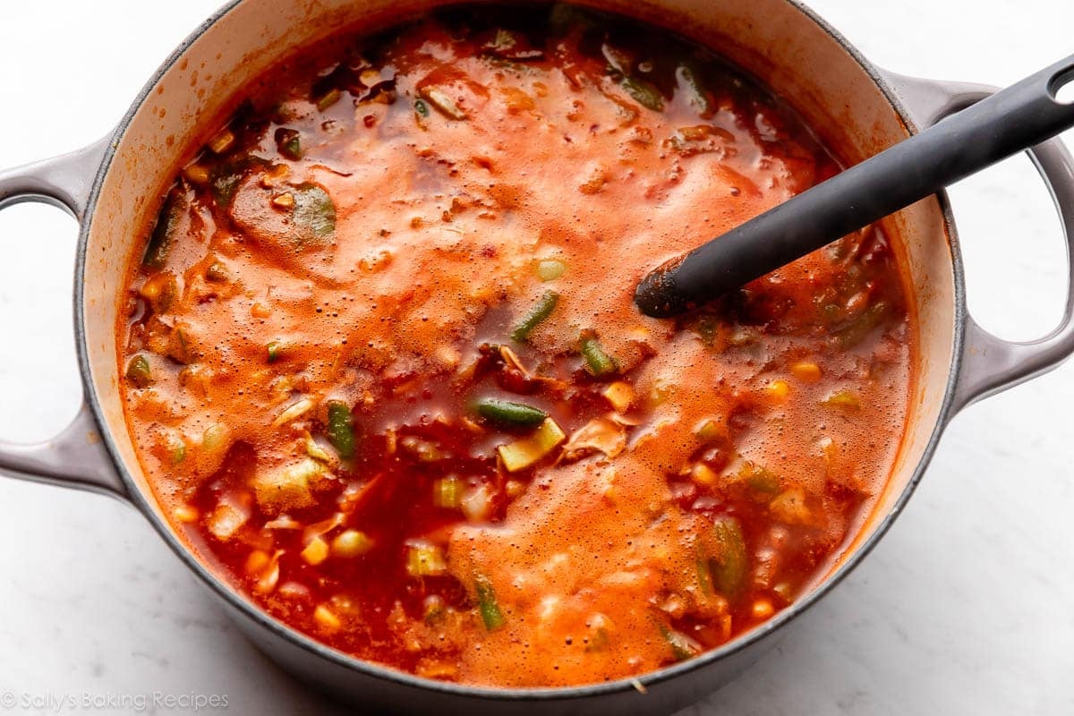 dutch oven with crab soup inside.