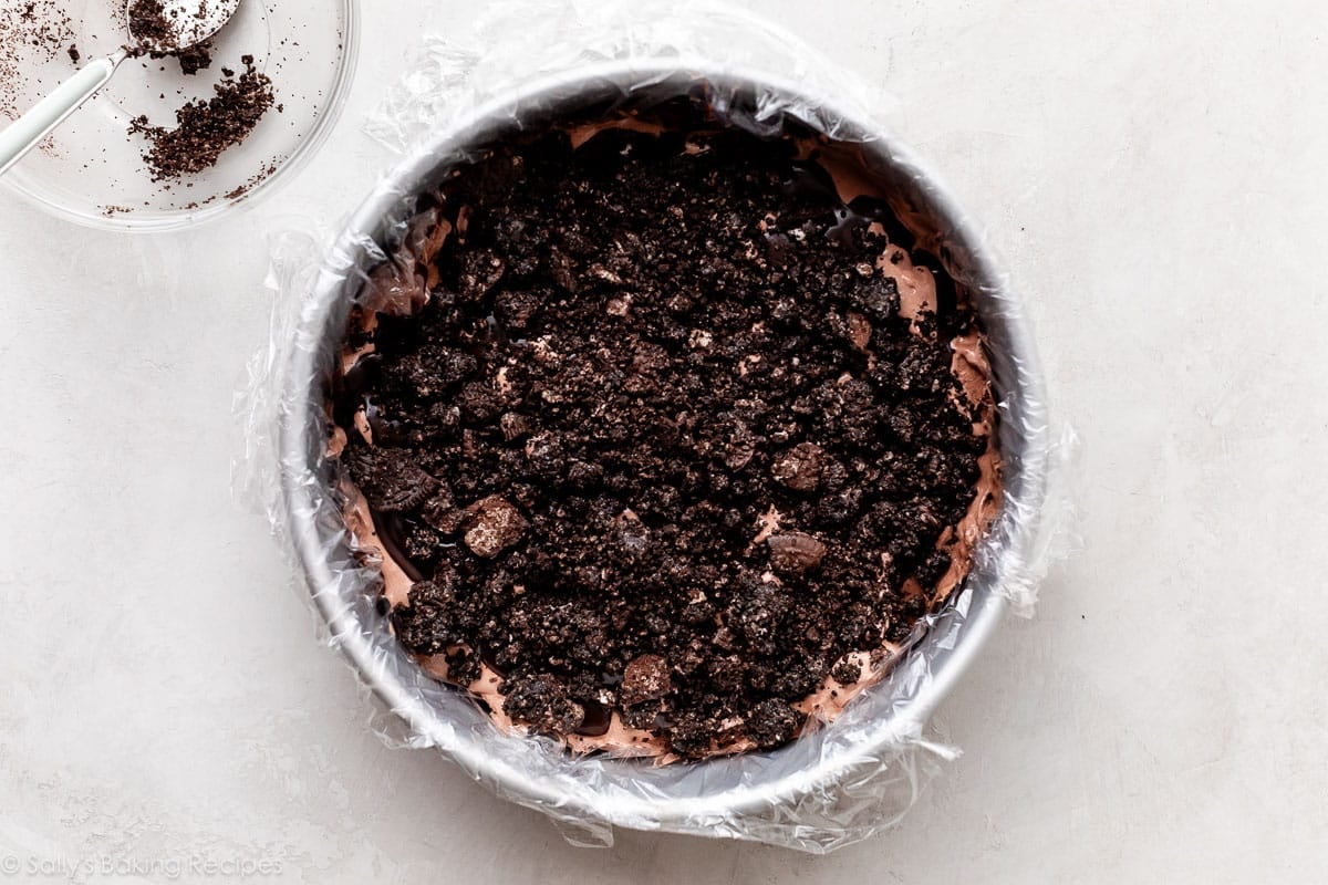 Oreo crunchy pieces in springform pan.